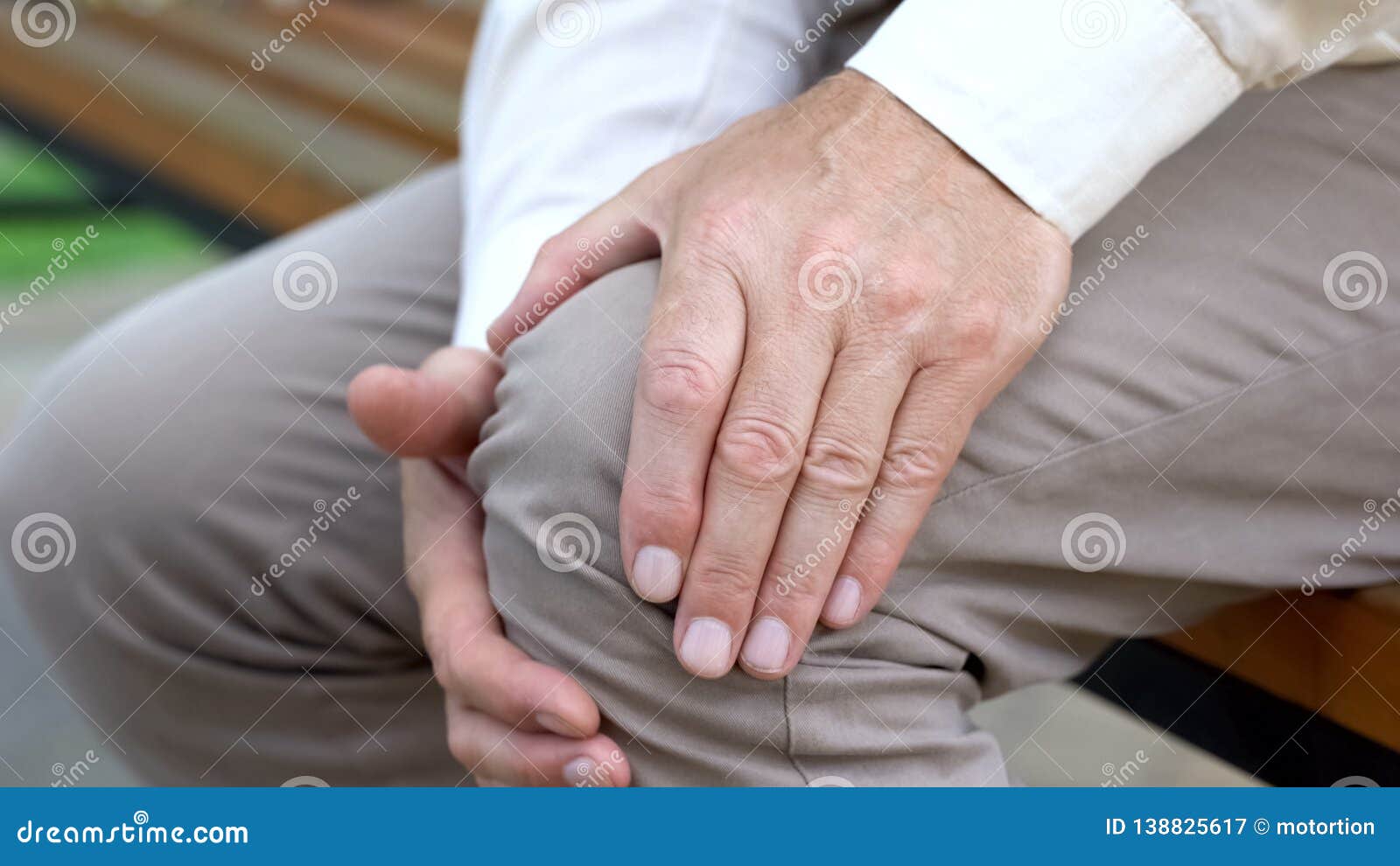 Senior Male Touching Knee, Sitting On Bench, Pain In Joints, Problems