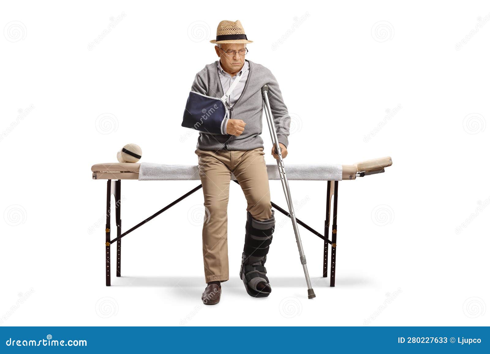 Senior Man with a Broken Arm and Leg Sitting on a Bed for Physical Therapy Stock Image Image