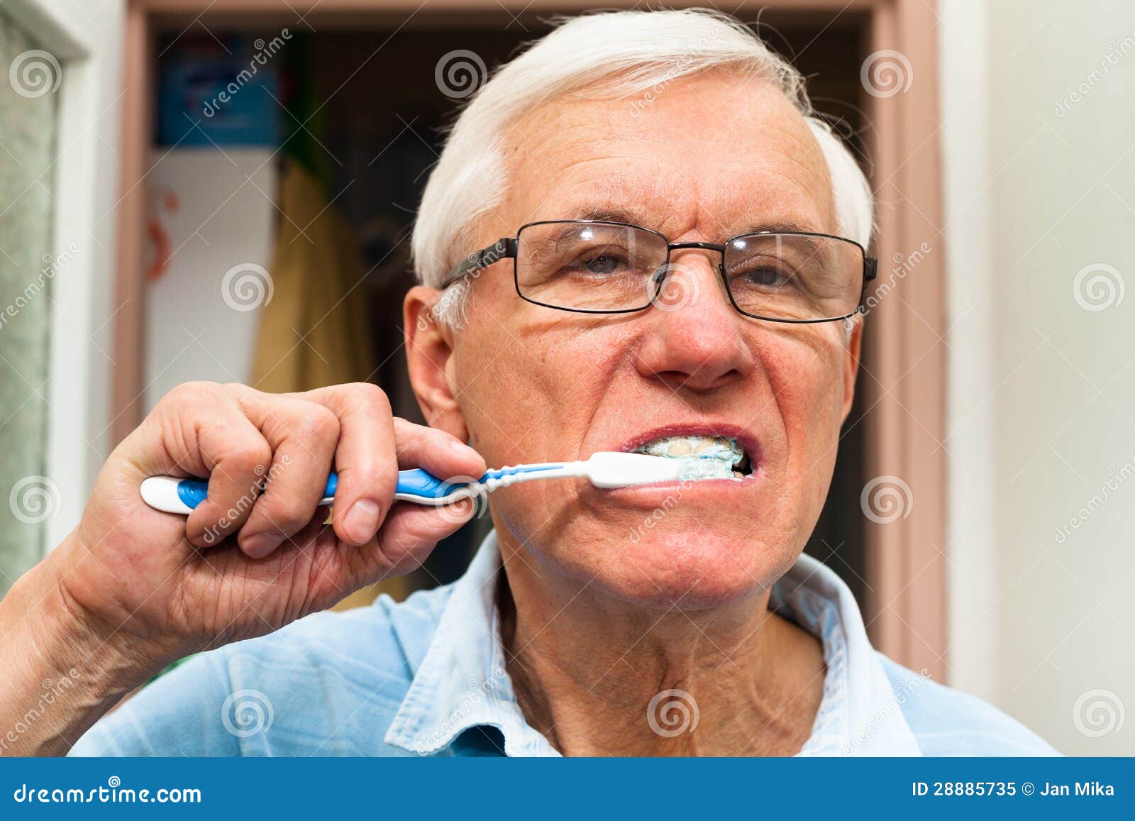 Senior Man Brushing His Teeth Stock Image Image of indoors, older