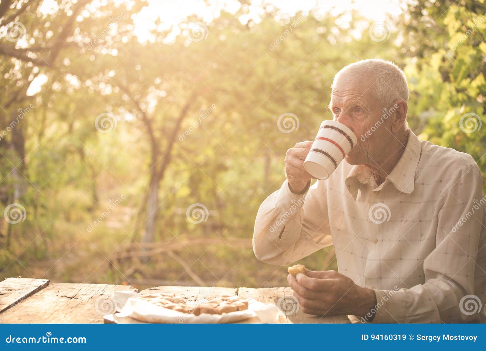 Senior man drinking a tea stock image. Image of couple 94160319