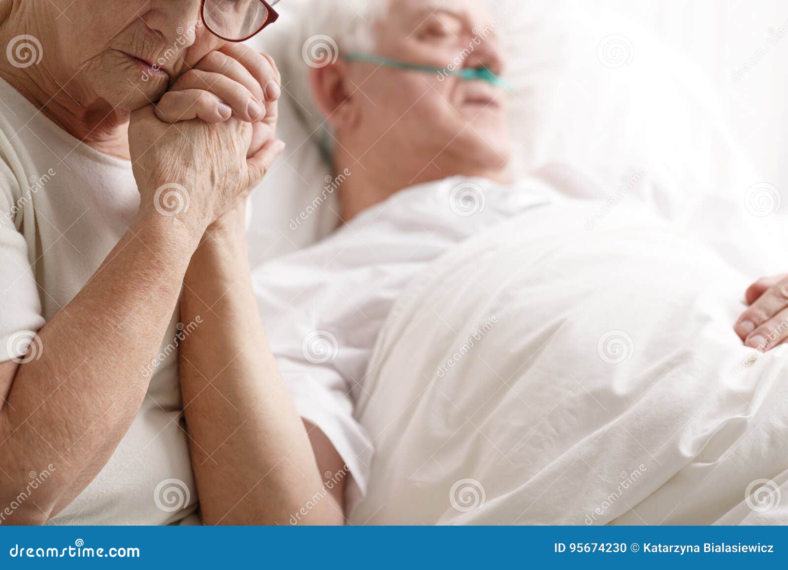 Senior Man in Hospital Bed and His Wife Holding His Hand Stock Photo ...