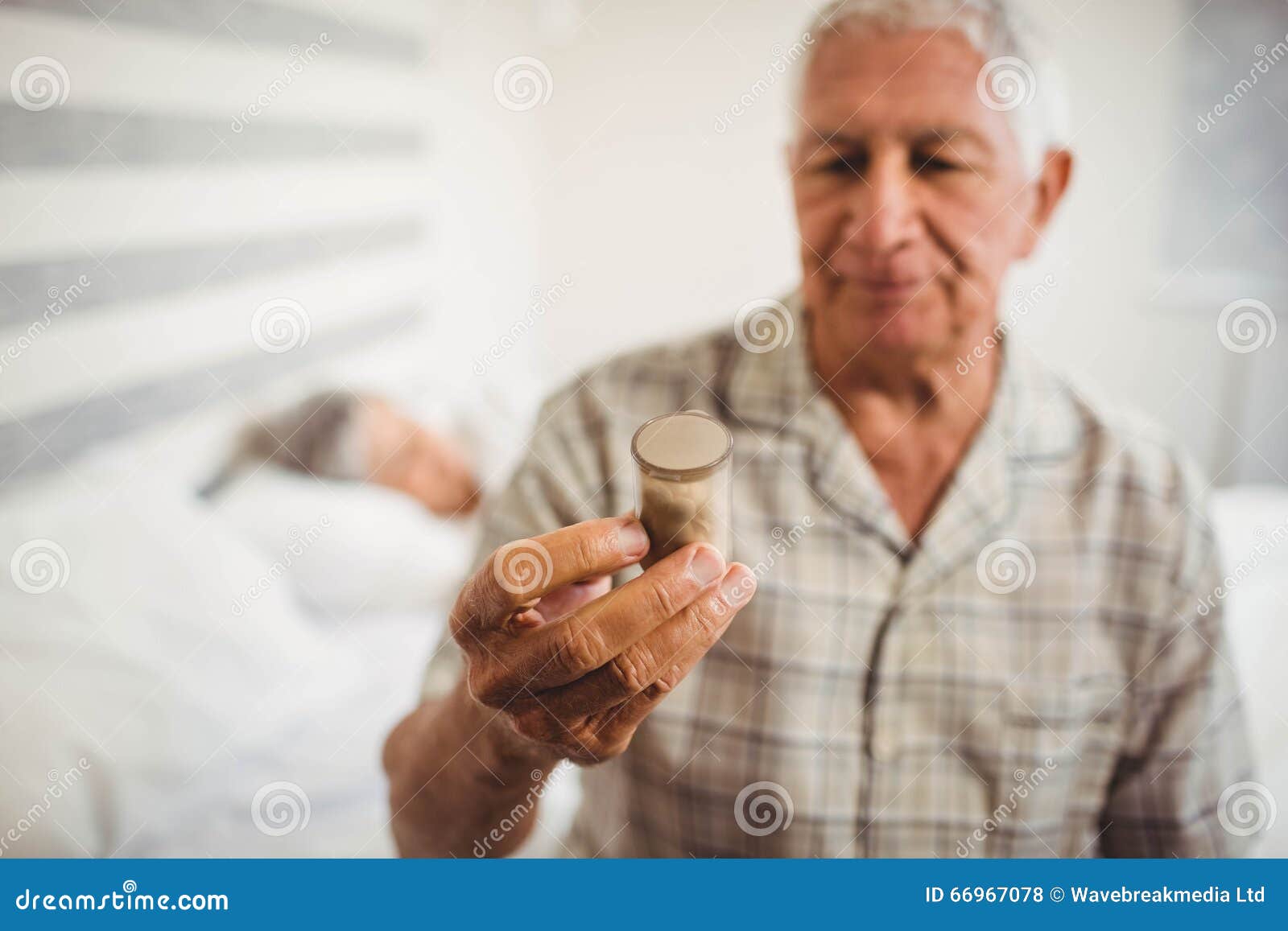 Senior Man Looking at a Pill Bottle Stock Photo Image of difficulties
