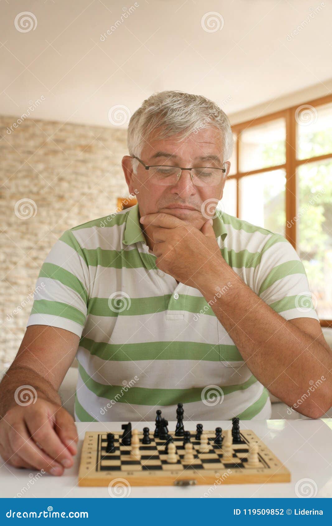 Man Playing Chess Against Himself Shot In The Studio Stock Photo, Picture  and Royalty Free Image. Image 30682890.