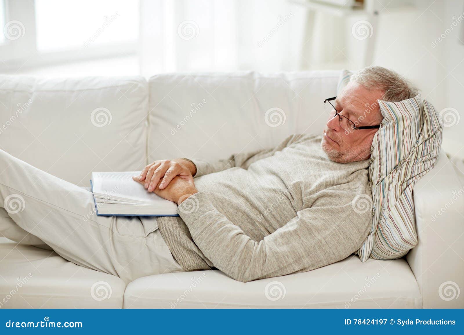 Senior Man Sleeping In Armchair Royalty Free Stock Photo