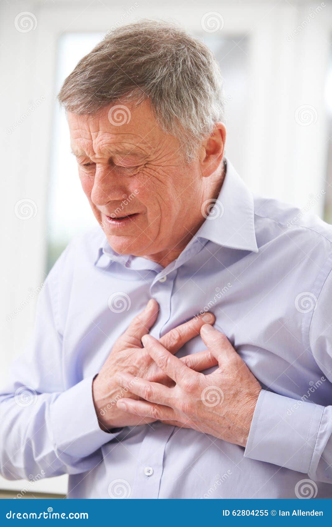 Senior Man Suffering Heart Attack at Home Stock Image - Image of ...