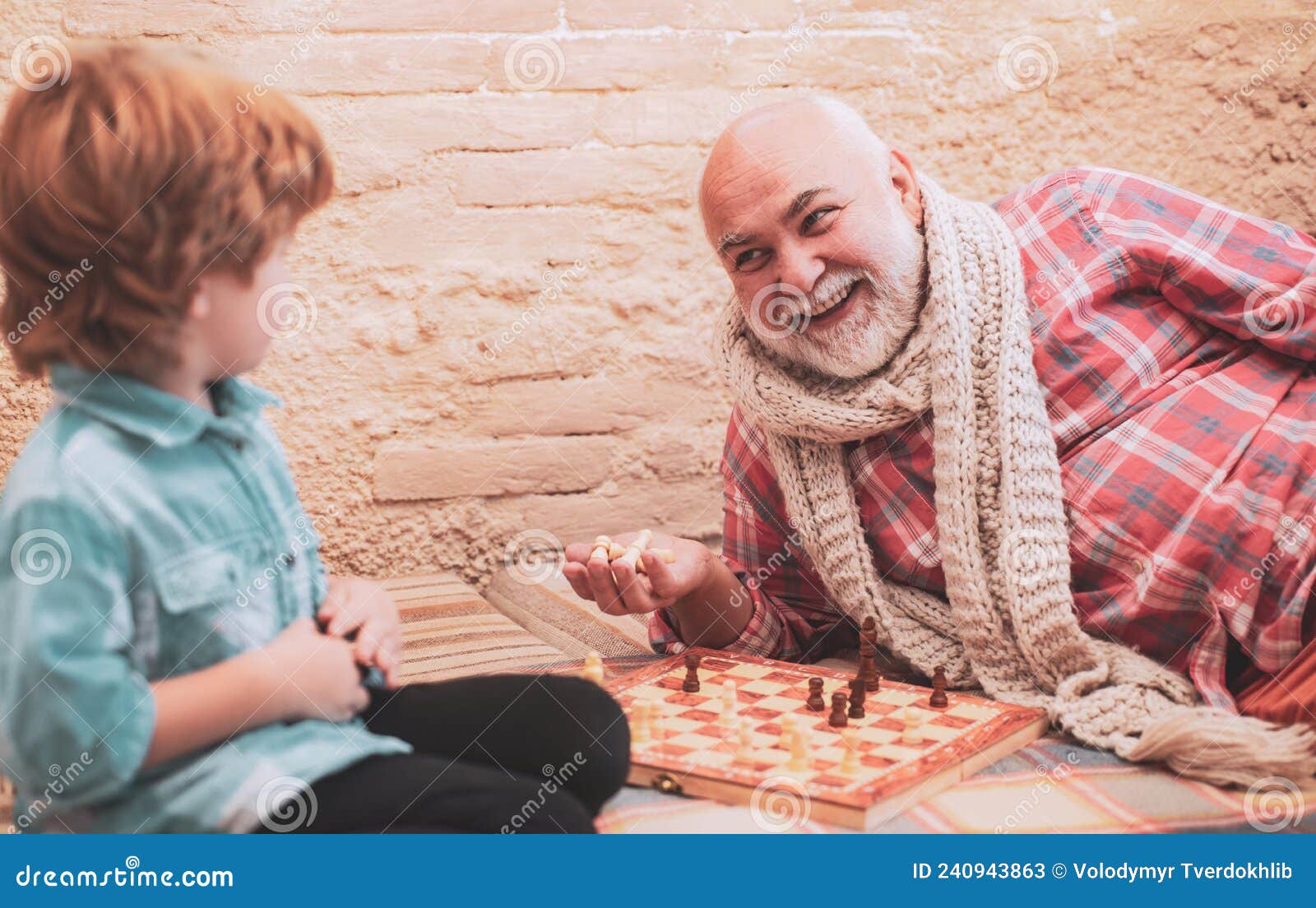 Handsome Male Model Considers His Next Chess Move Stock Photo