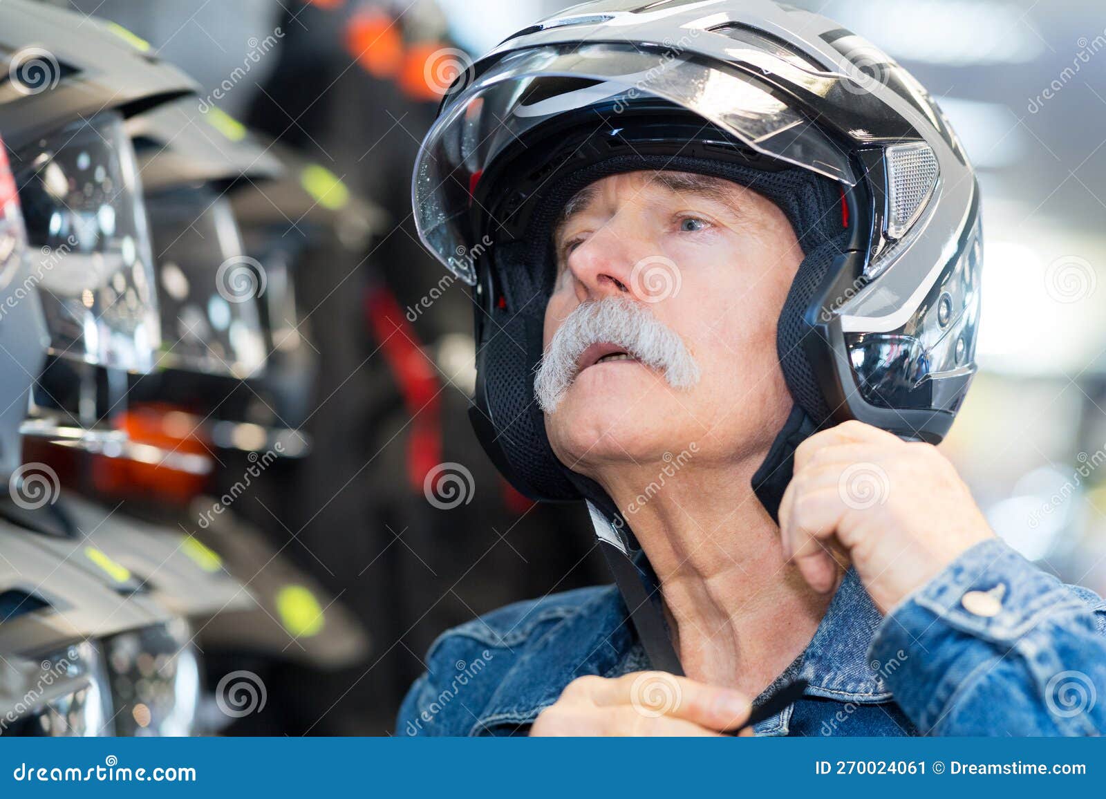 Senior Man Trying on Crash Helmet Stock Image Image of customer