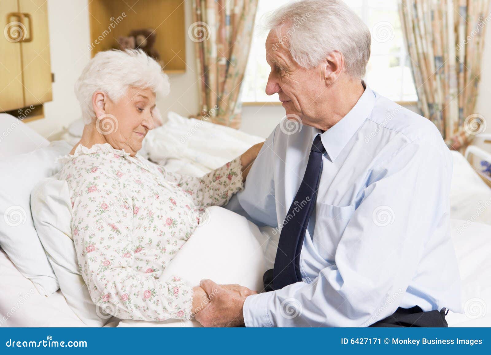 Senior Man Visiting His Wife in Hospital Stock Image
