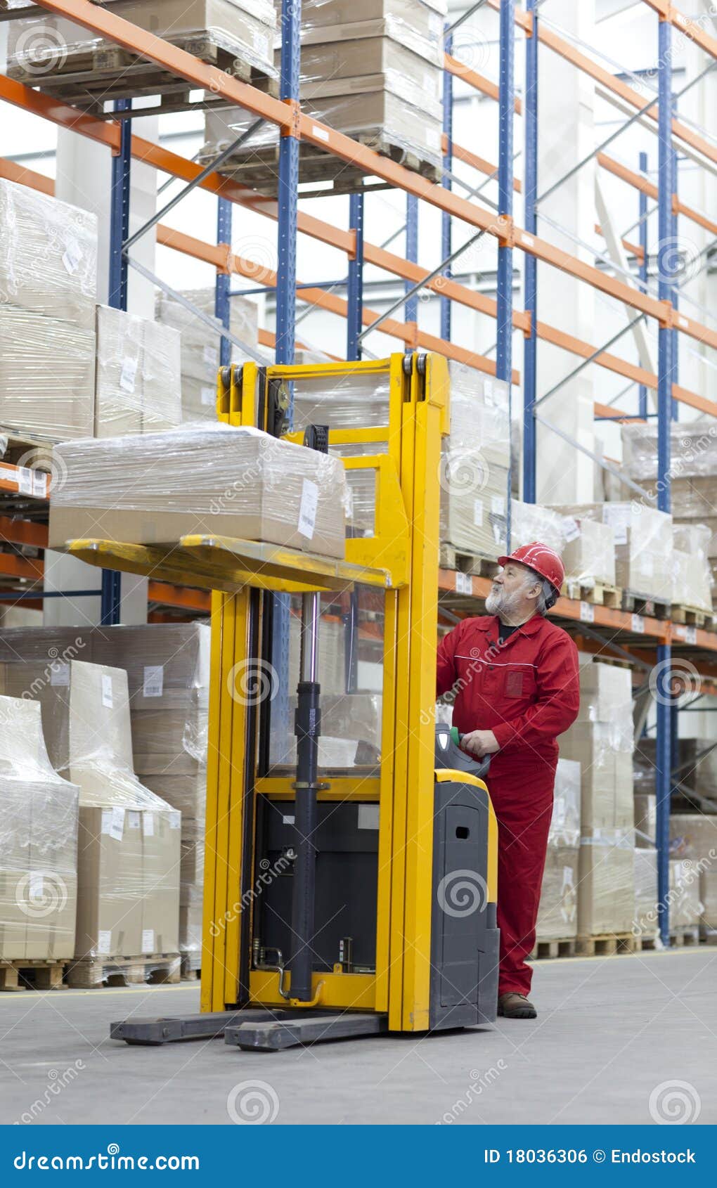 Senior Manual Forklift Operator In Warehouse Royalty Free Stock Image
