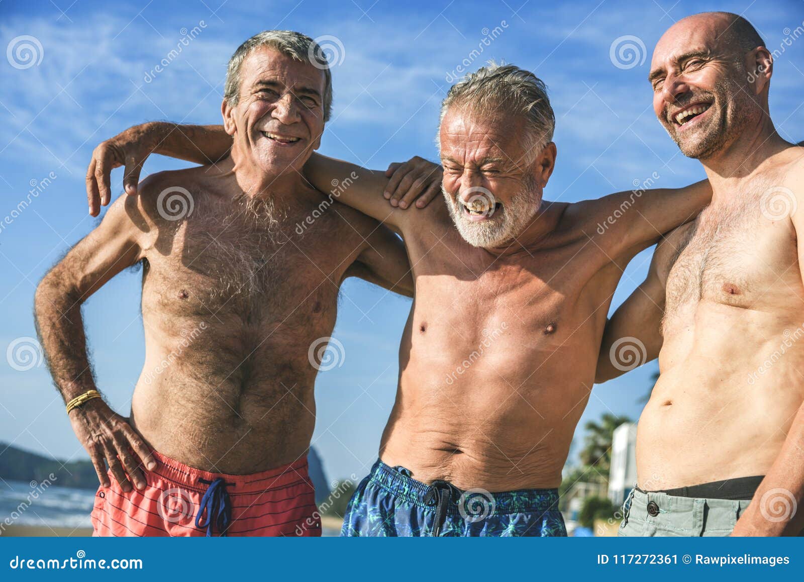 Senior Men Having Fun on the Beach Stock Image - Image of community