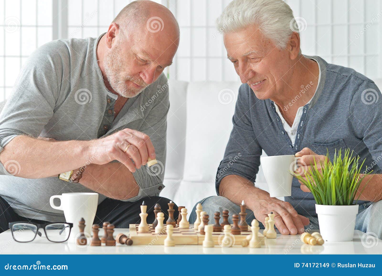 Senior men playing chess stock image. Image of game, aged 74172149
