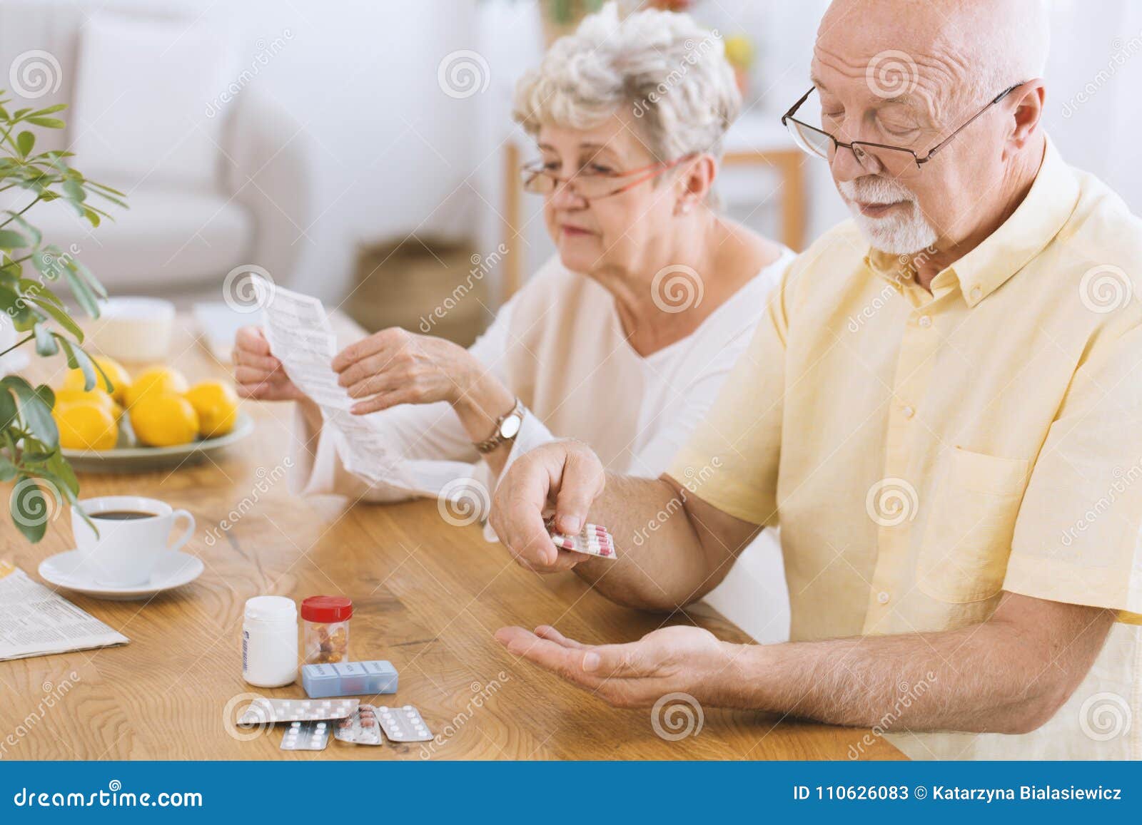 senior man taking medication