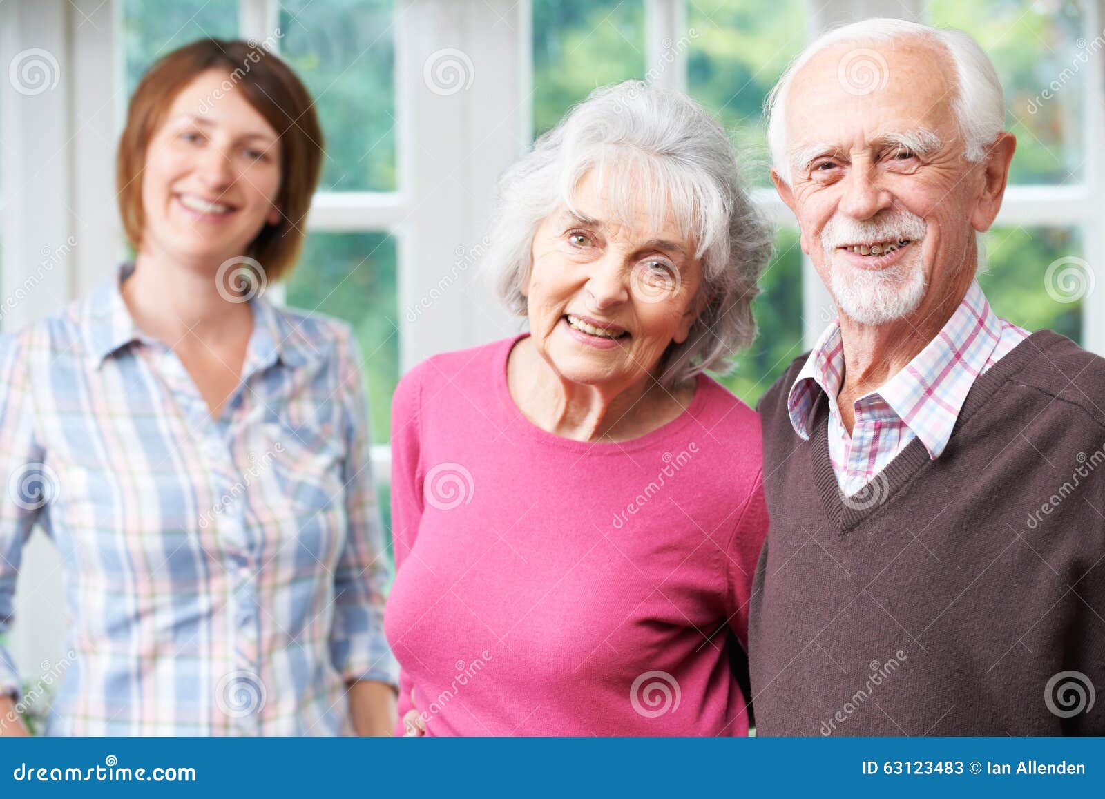 senior parents with adult daughter at home