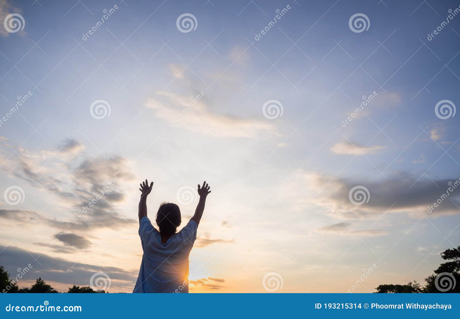 Senior is Rising Hands To the Sky, Morning Sun or Dawn Warm Light, New