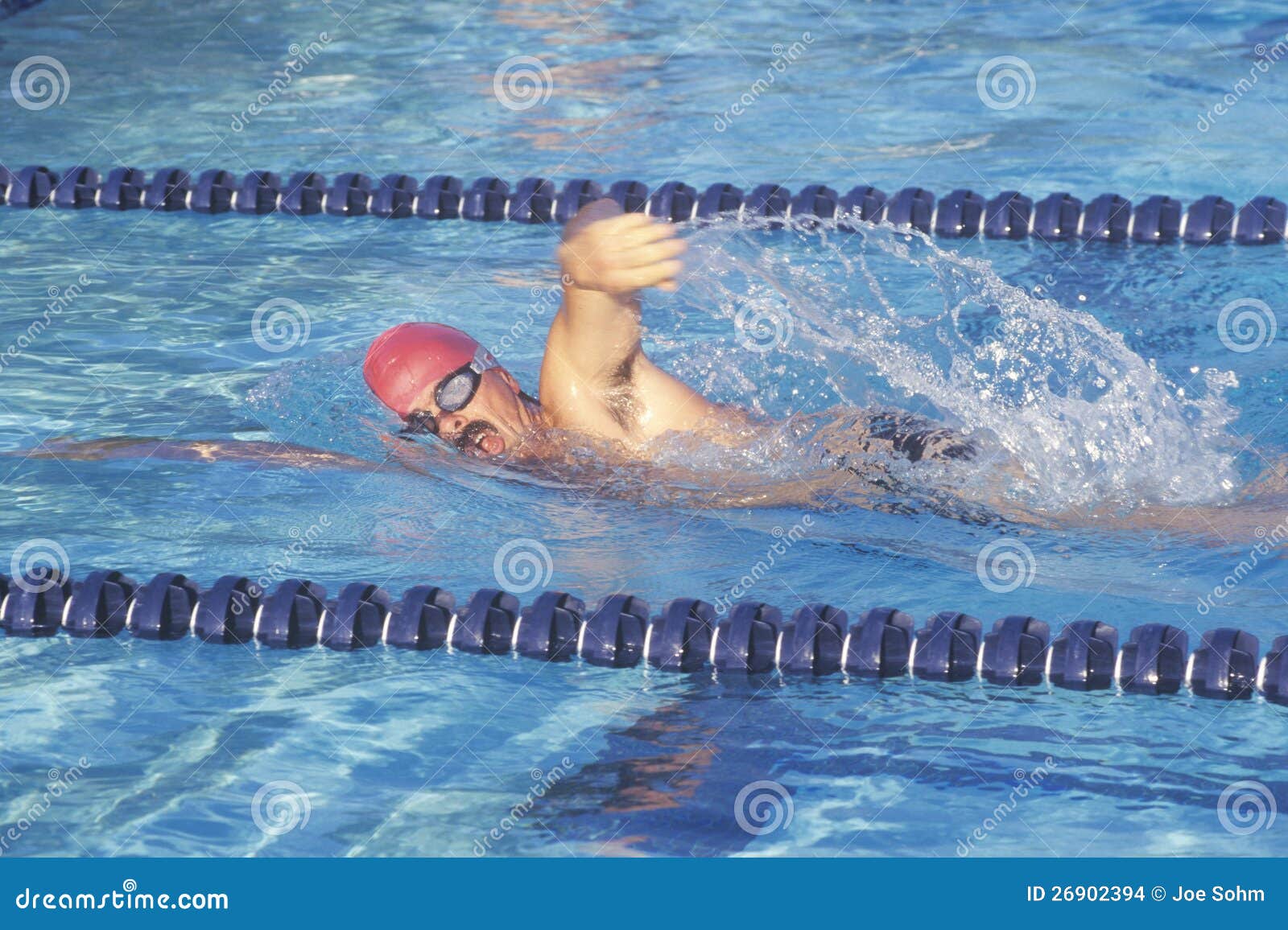 Senior Man Swimming Laps, Underwater View RoyaltyFree Stock Image