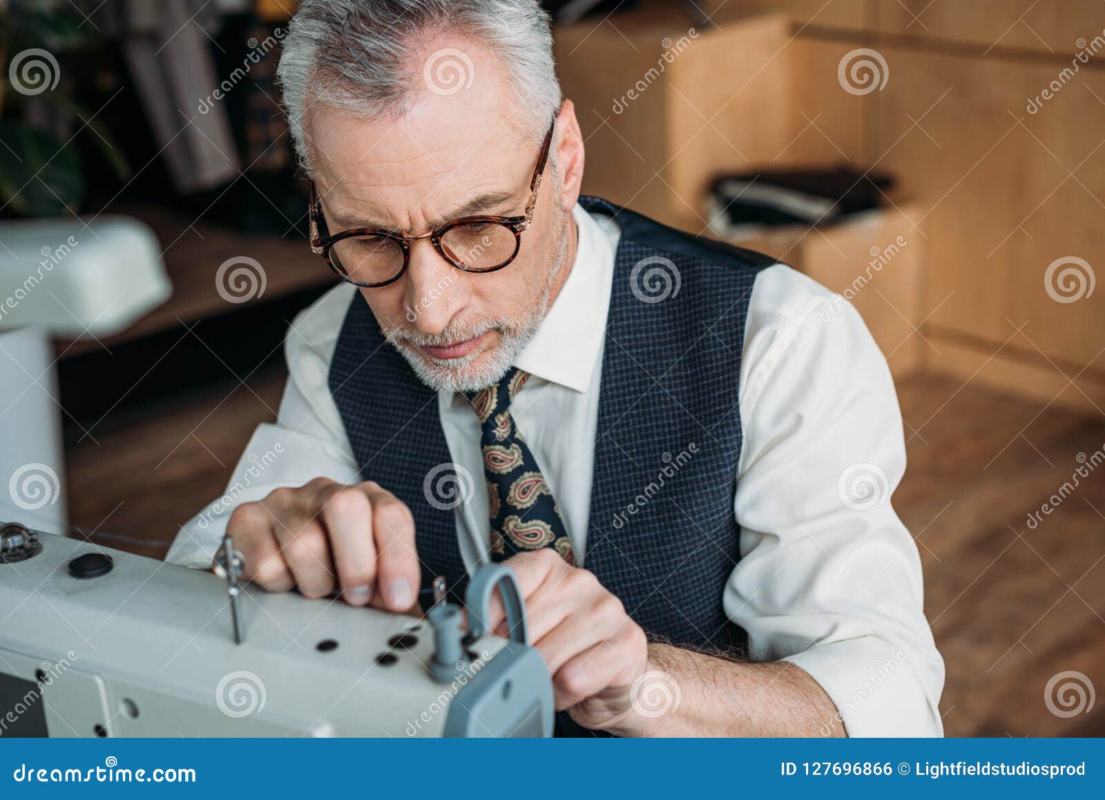 Senior Tailor Threading Needle of Sewing Machine Stock Photo Image of