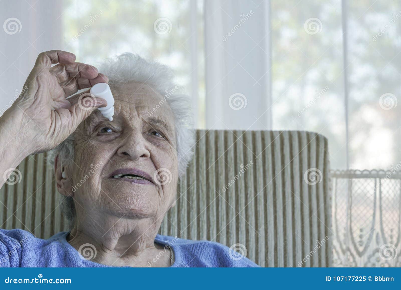 Senior Woman Applying Eye Drop on Her Eye Stock Image Image of