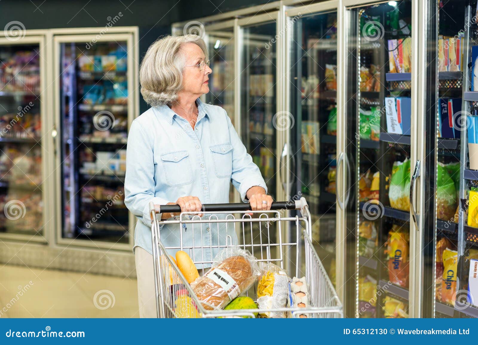 senior woman buying food