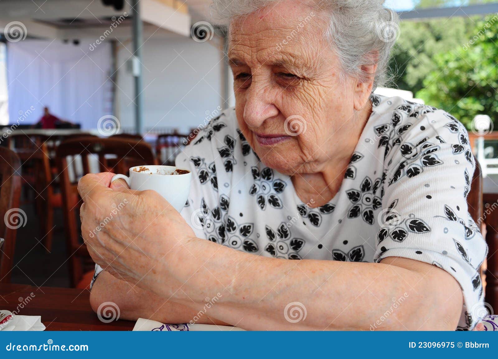 Senior woman at cafe stock image. Image of grief, hand 23096975
