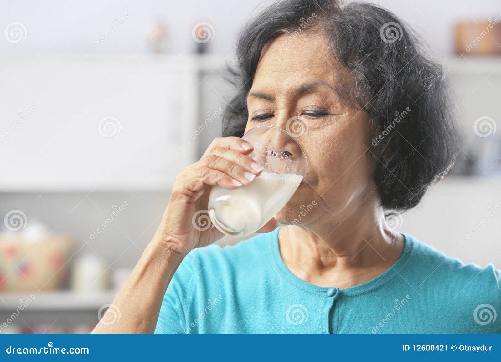 Senior woman drinking milk stock image. Image of people 12600421