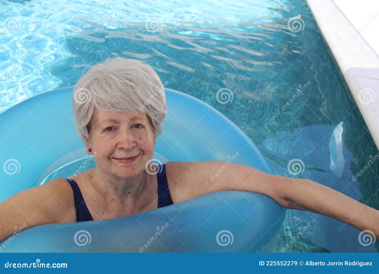 Senior Woman Floating in Inflatable Ring Stock Image Image of holiday