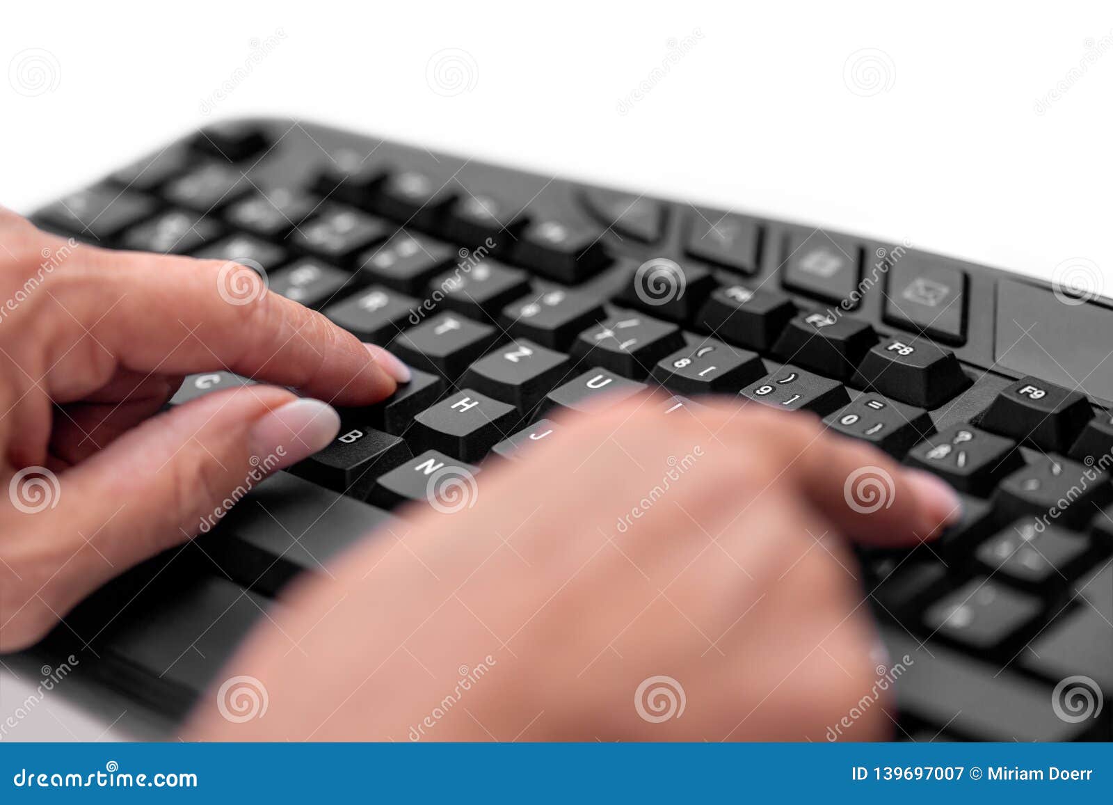senior woman hands with a hunt and peck or brady typing on the keyboard