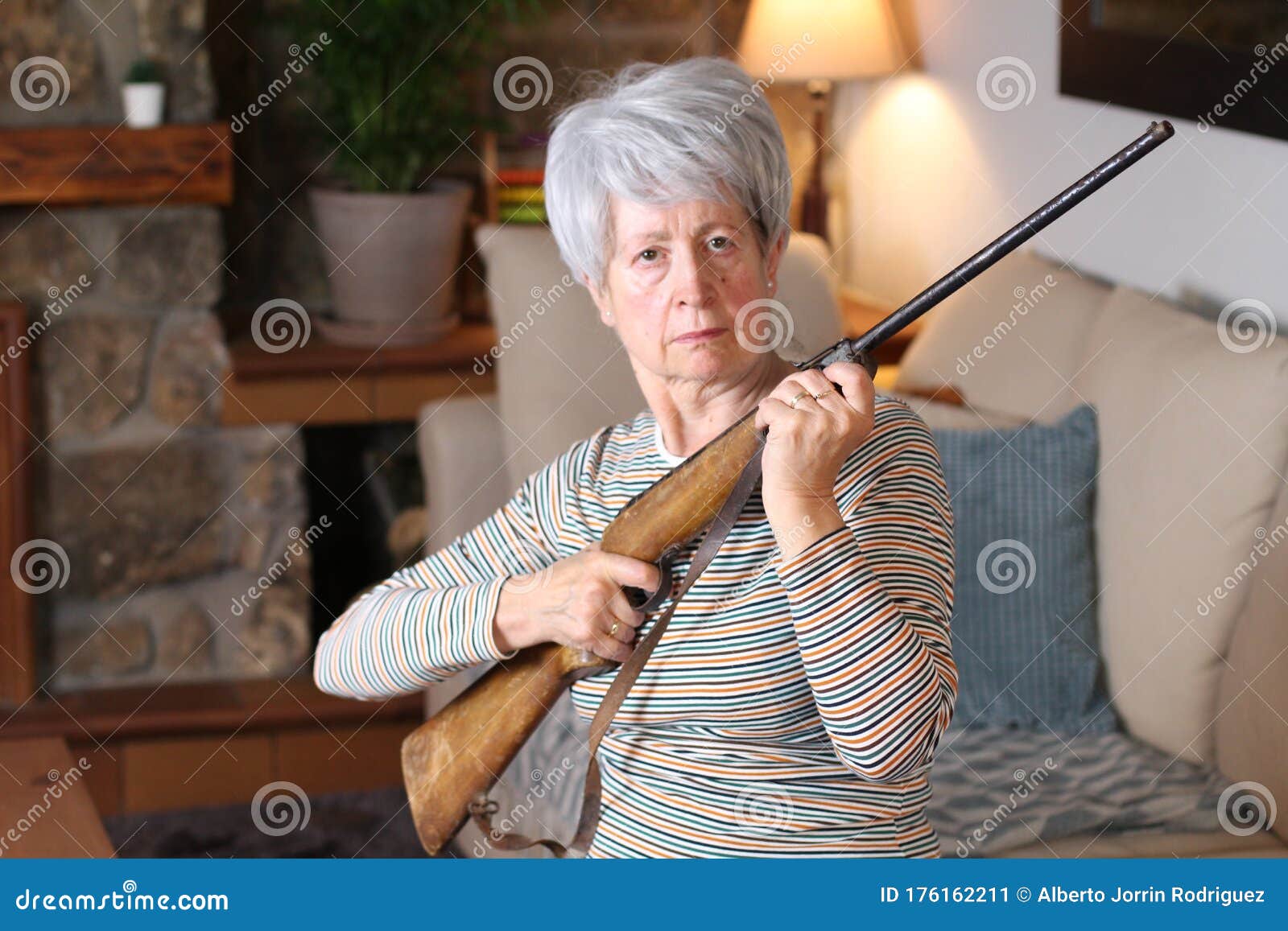 Mad Granny With Rifle RoyaltyFree Stock Image