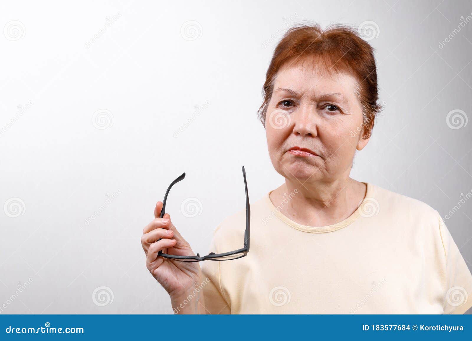 Elderly Lady Is Holding Cellphone. Stock Photo - Image of 