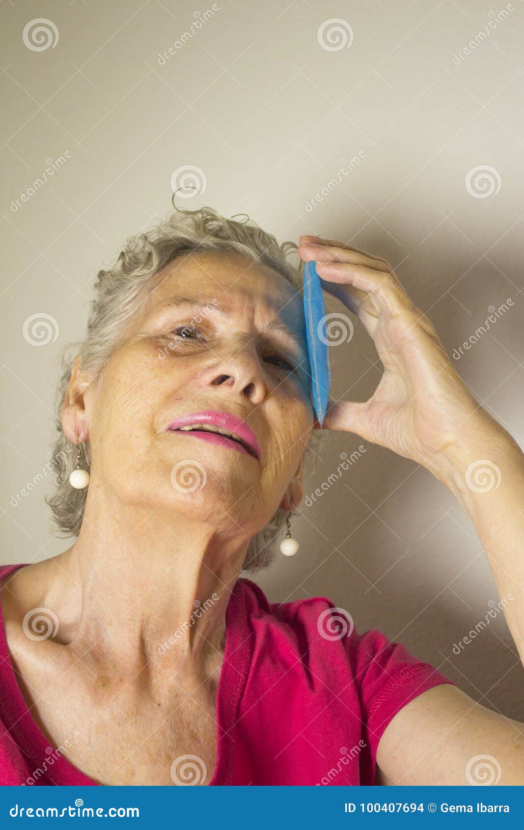Senior Woman with Ice on Head for Headache Stock Photo Image of blue