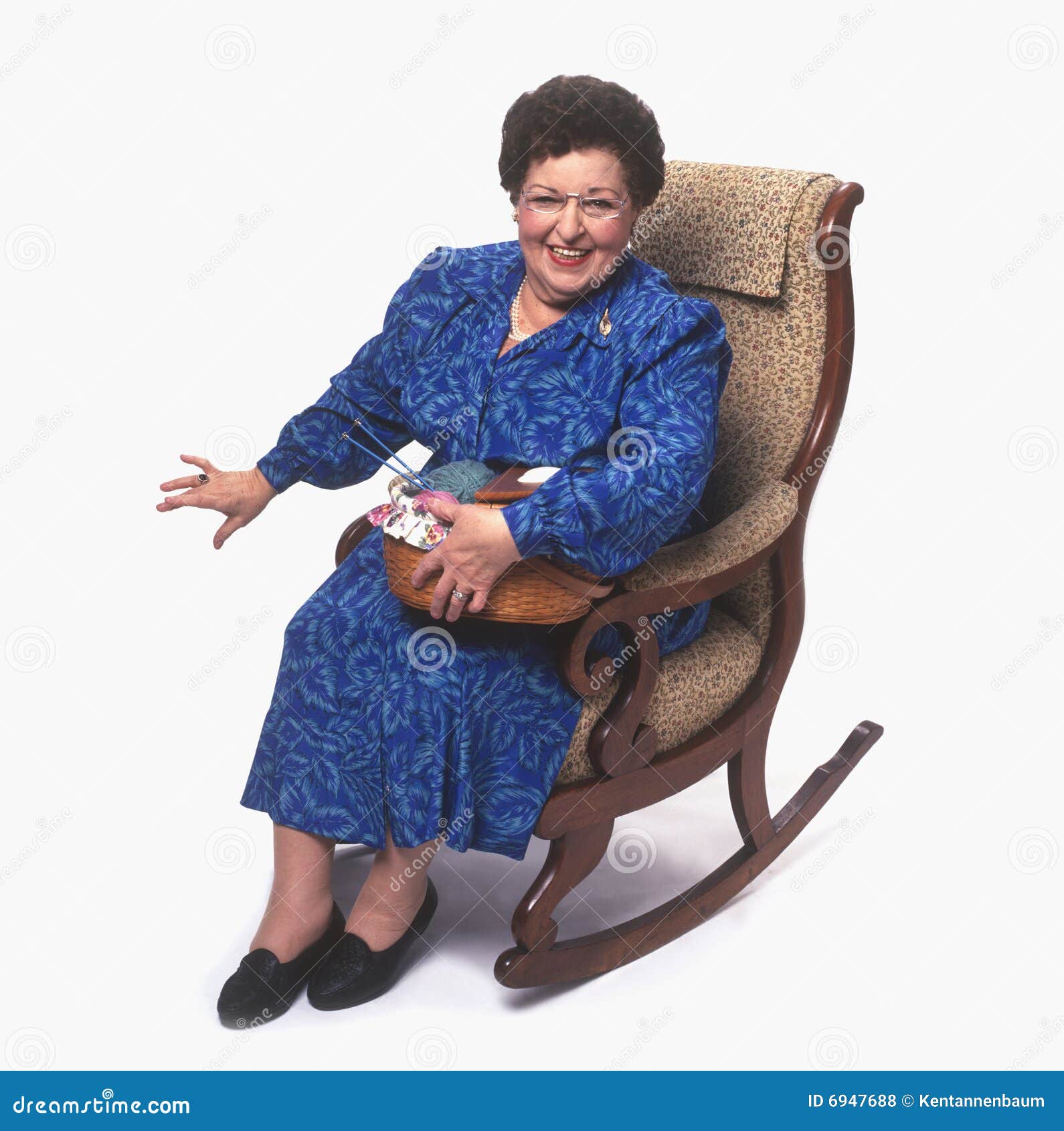 Senior Woman With Knitting On Rocking Chair Royalty Free Stock Photos