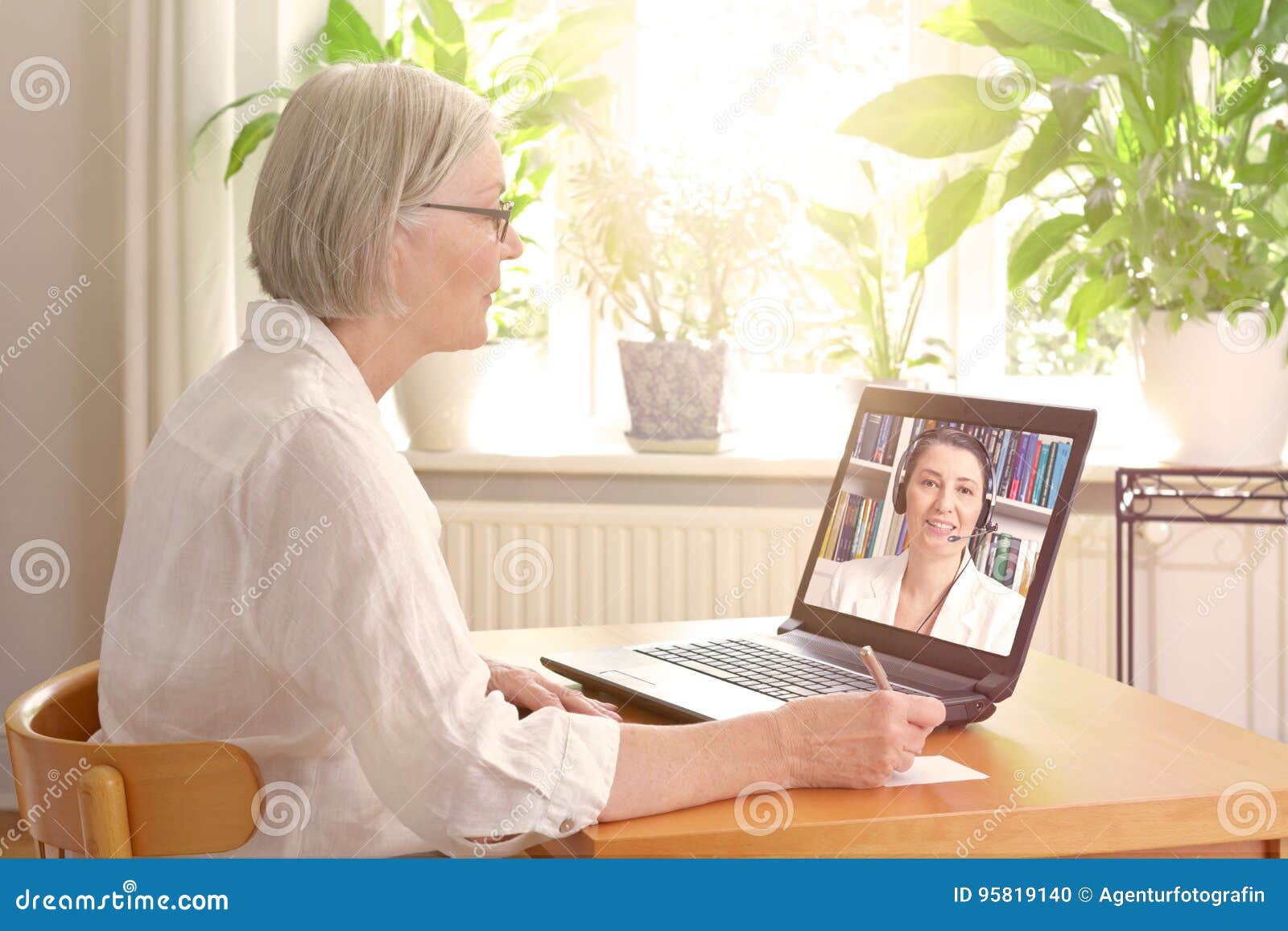 senior woman laptop online therapy