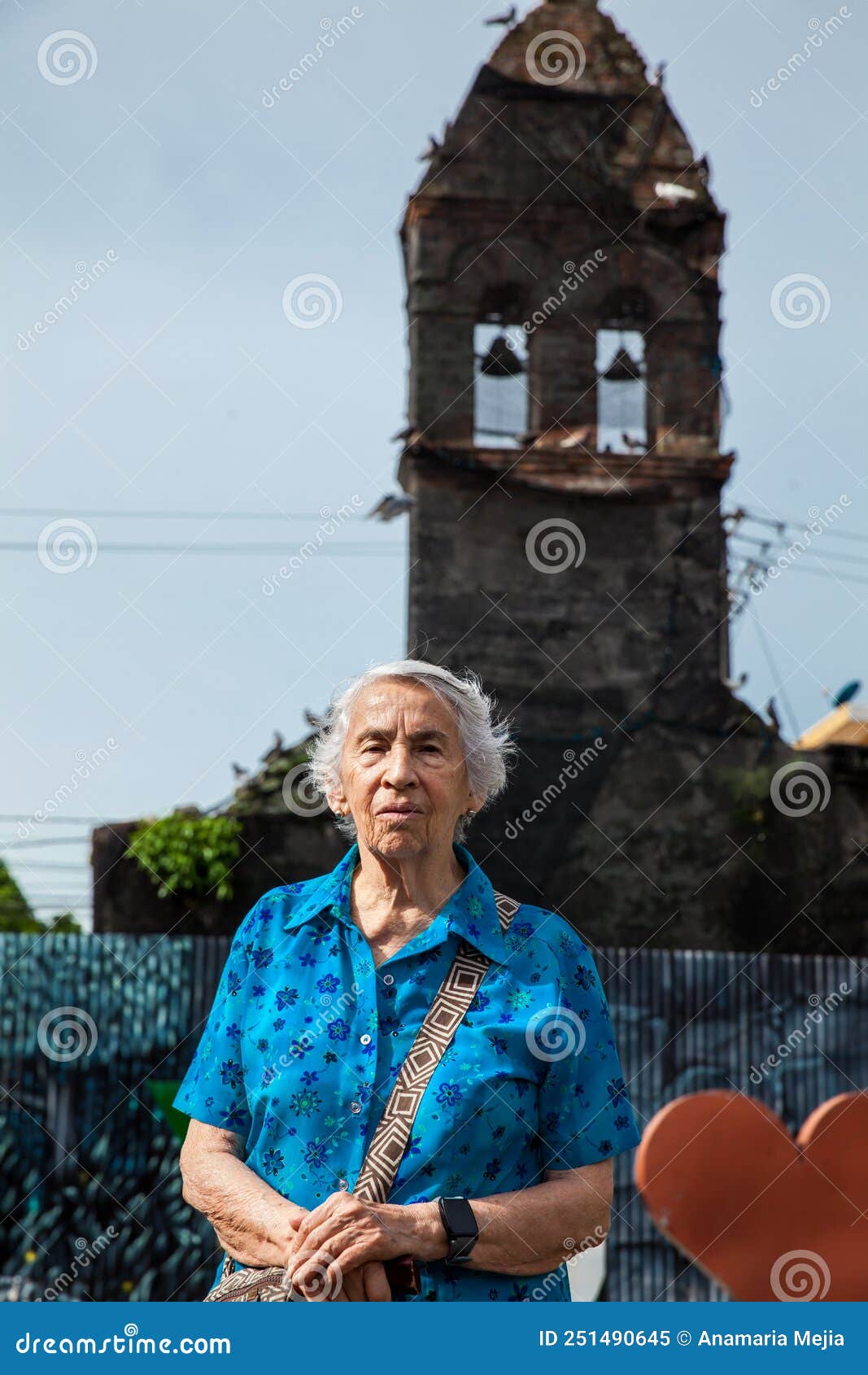 senior woman at the ruins of the convent of santo domingo in the city of mariquita