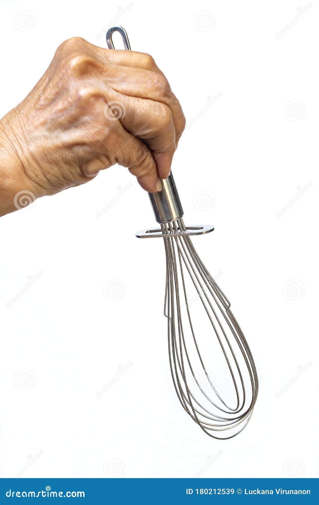 Hand Holding Whisk Photos and Images