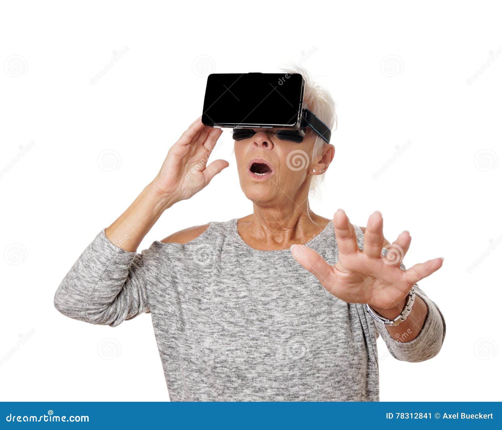 Senior Woman with VR Virtual Reality Headset is Stunned Stock Image