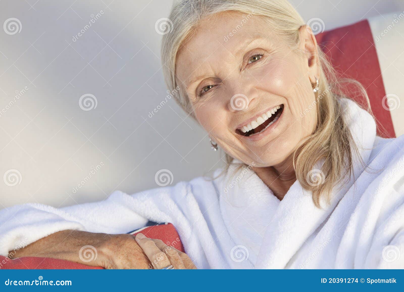 Senior Woman in White Bathrobe Stock Photo Image of bathrobe, orange