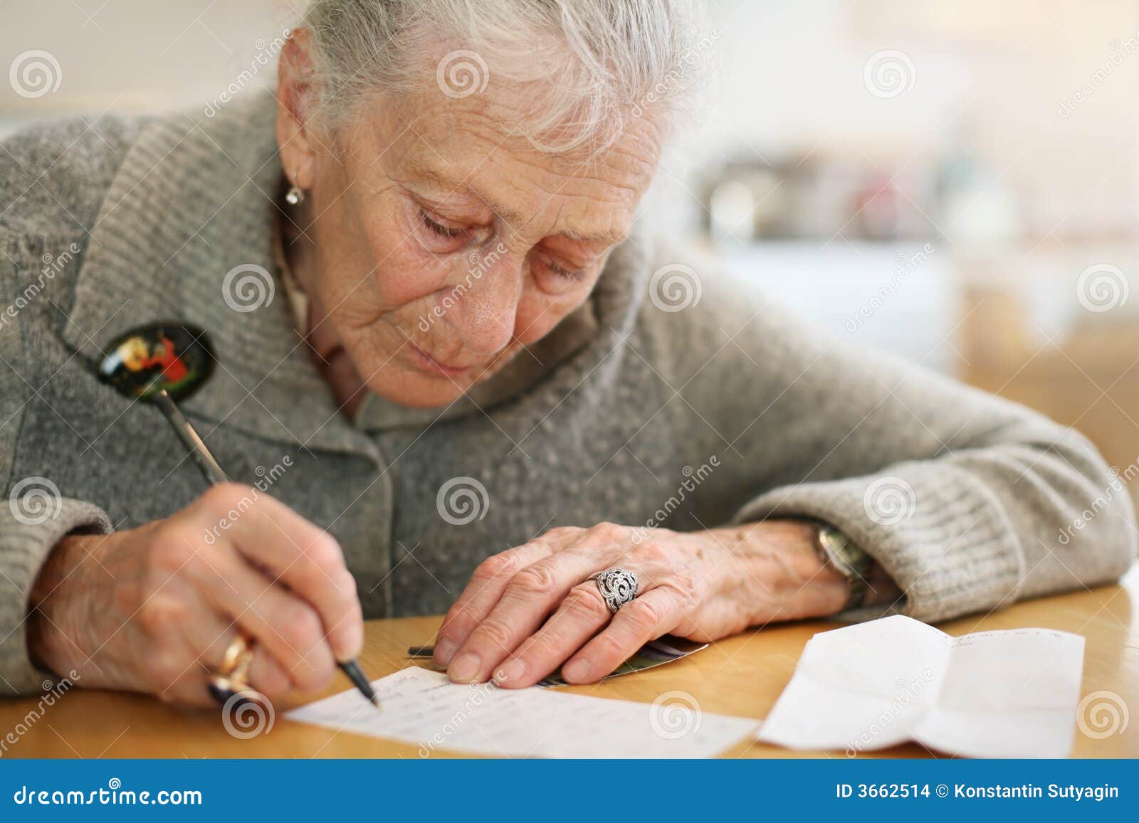 senior woman writing