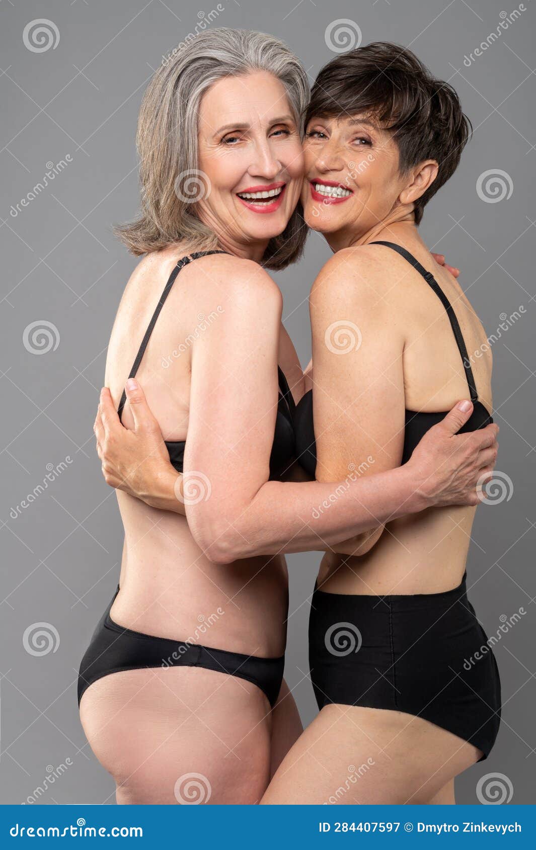 Senior Women in Black Bra and Panties Standing Close Stock Image