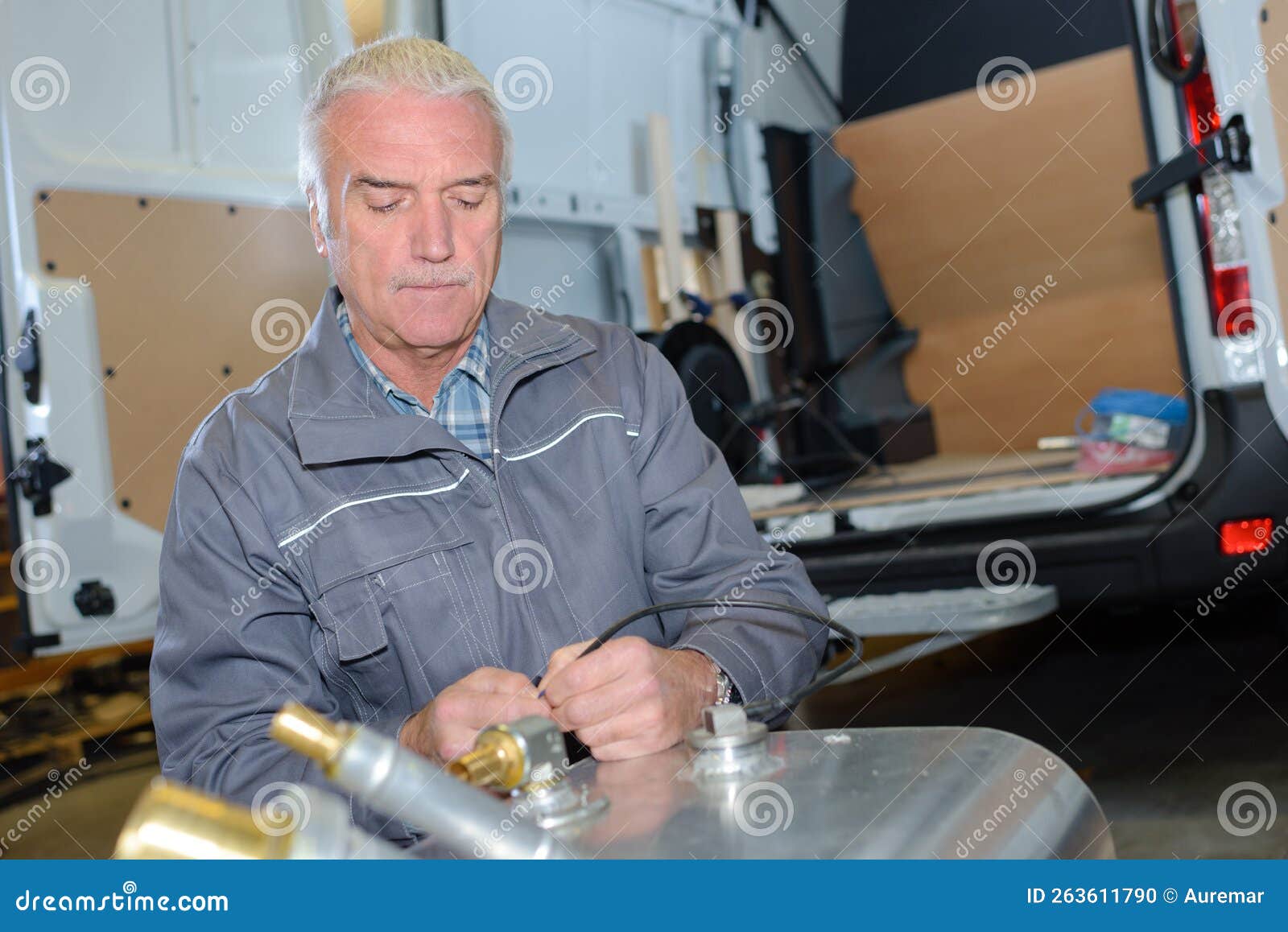 Senior Worker Connecting Wire Stock Photo Image of machinery