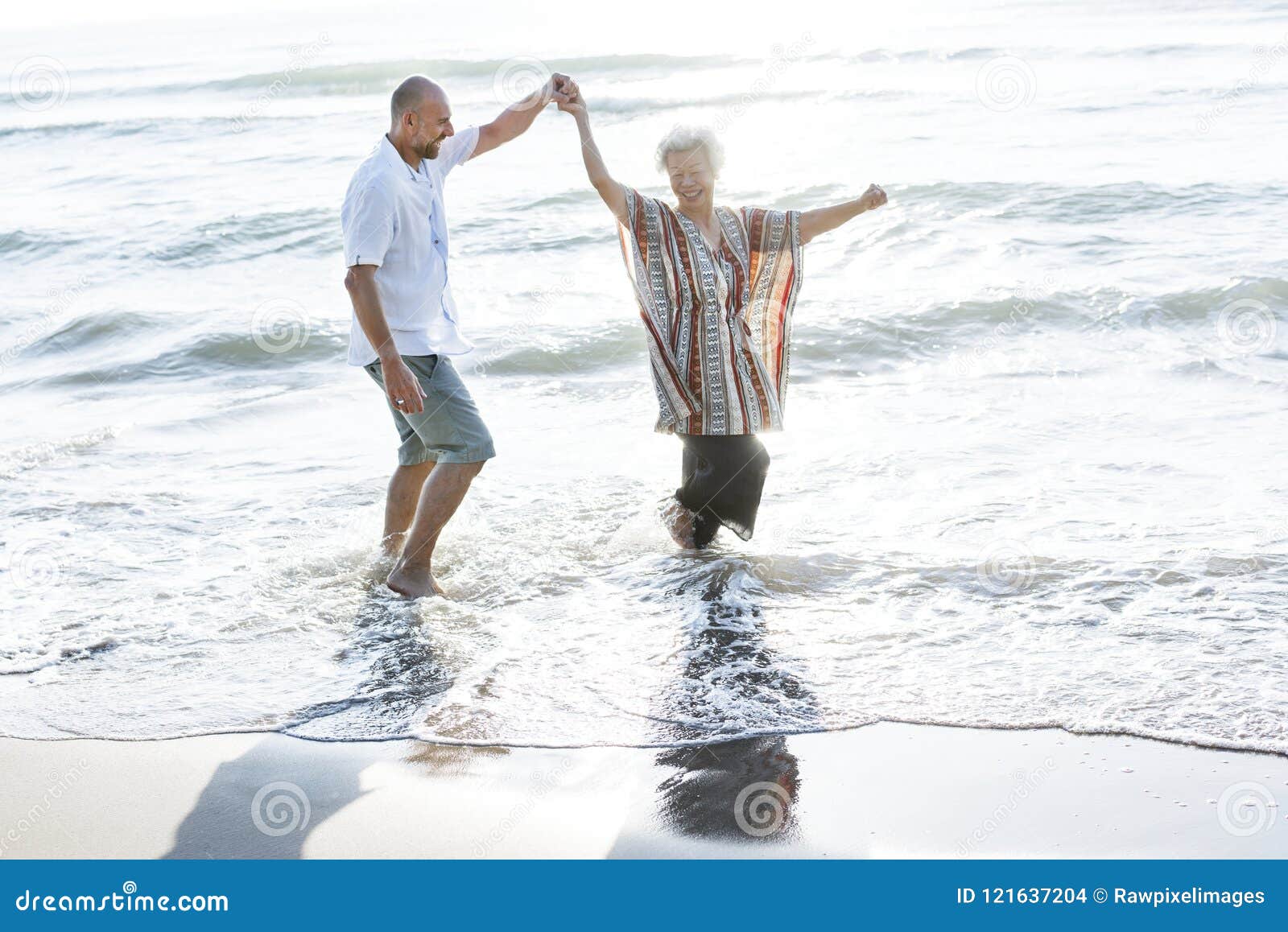 Seniors Enjoying a Tropical Beach Stock Photo Image of beachside