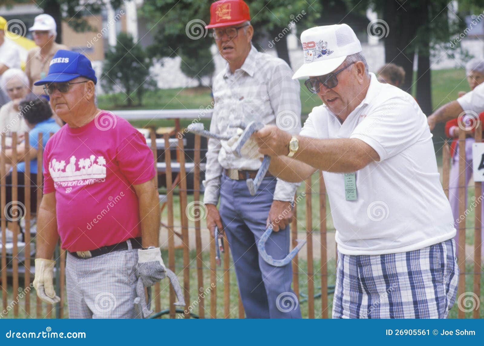 Seniors playing horseshoes editorial photo. Image of america 26905561