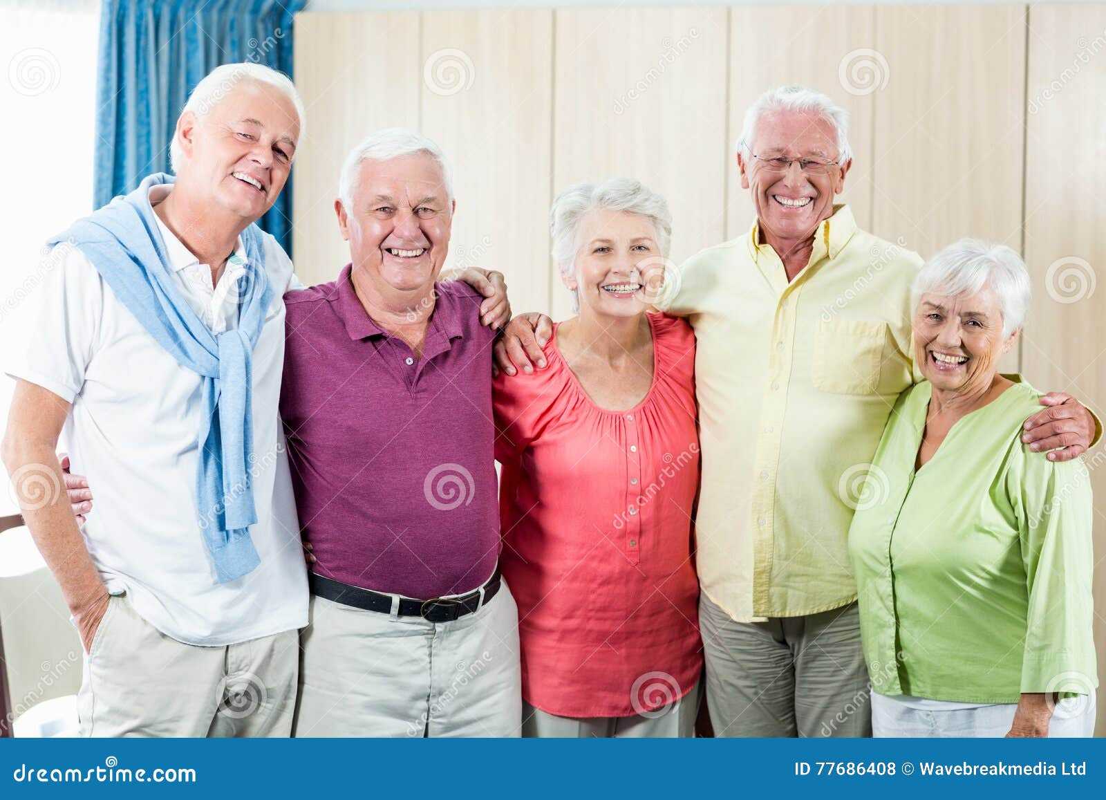 Seniors standing together stock photo. Image of friendly 77686408