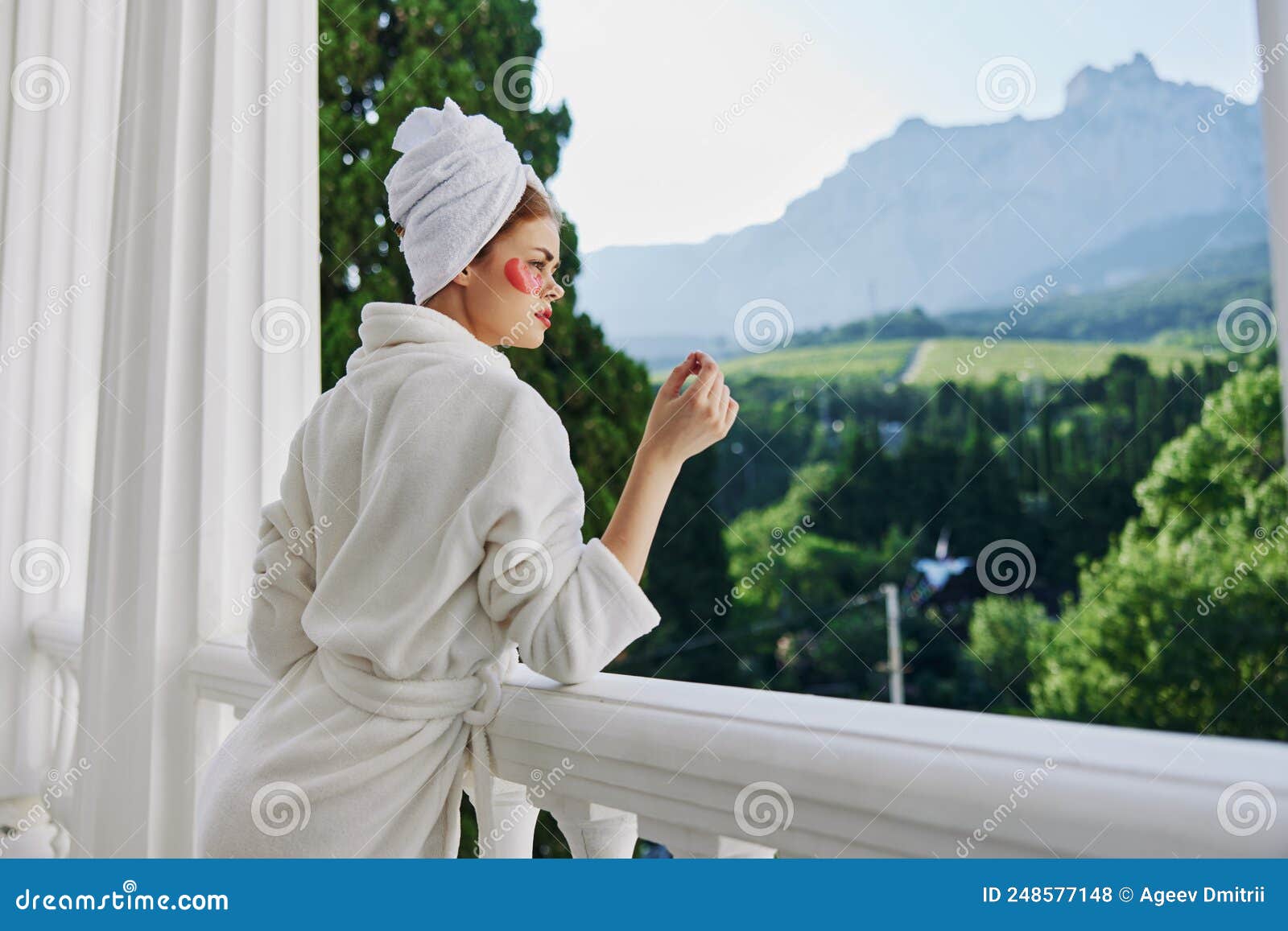 Sensual and Beautiful Woman in a Robe Stands on an Open Balcony Perfect ...