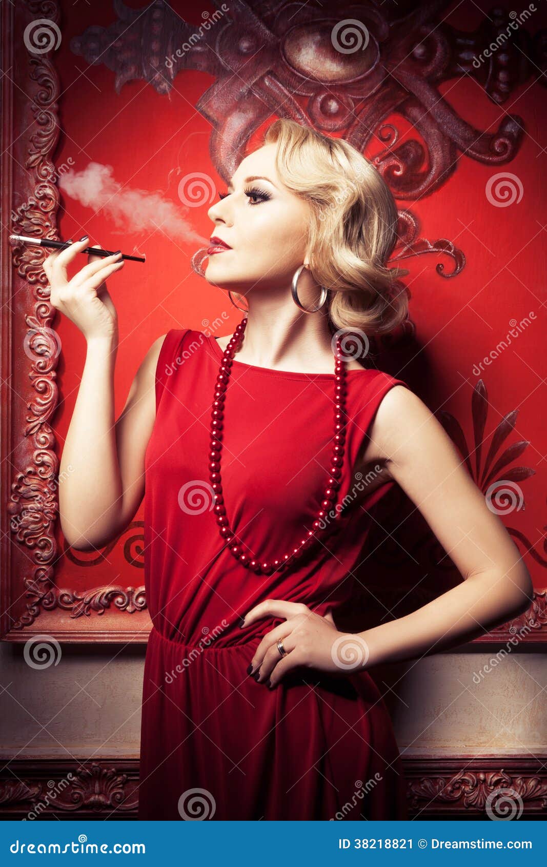 Sensual Blonde Smoking Cigarette In Red Vintage Room Stock 