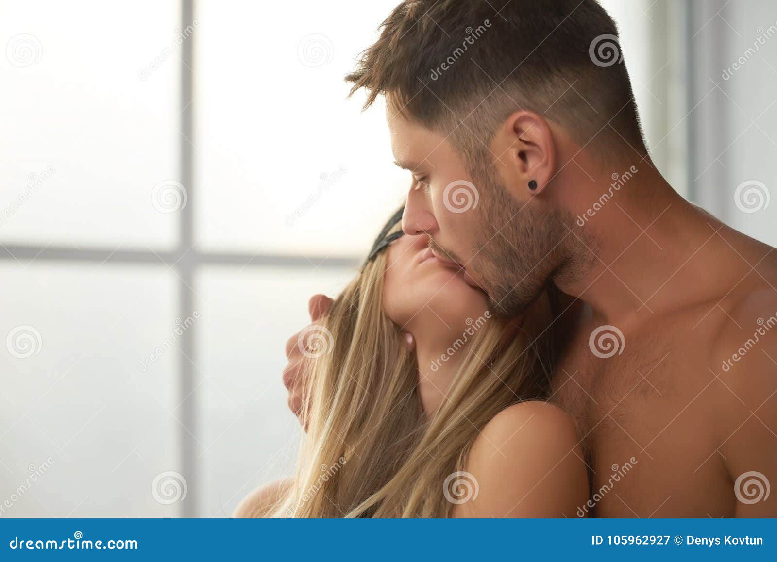 sensual couple kissing.