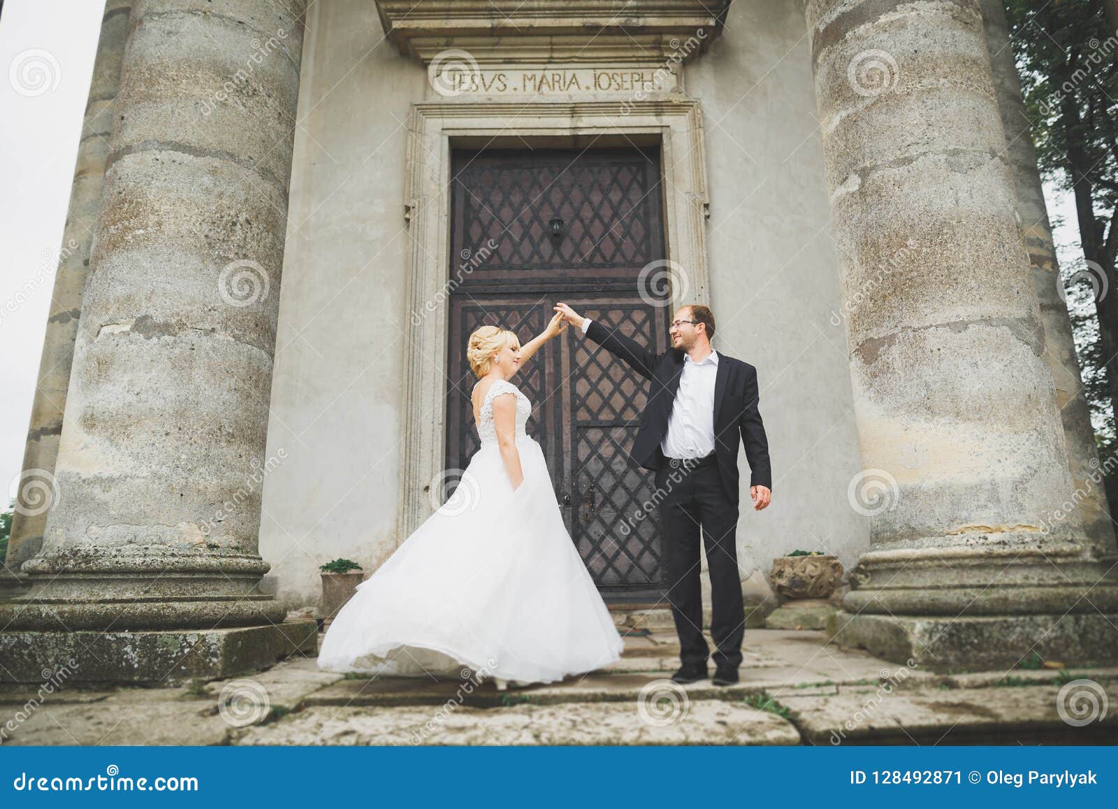 https://thumbs.dreamstime.com/z/sensual-married-couple-valentines-hugging-front-old-slavic-castle-sensual-married-couple-valentines-hugging-front-old-128492871.jpg