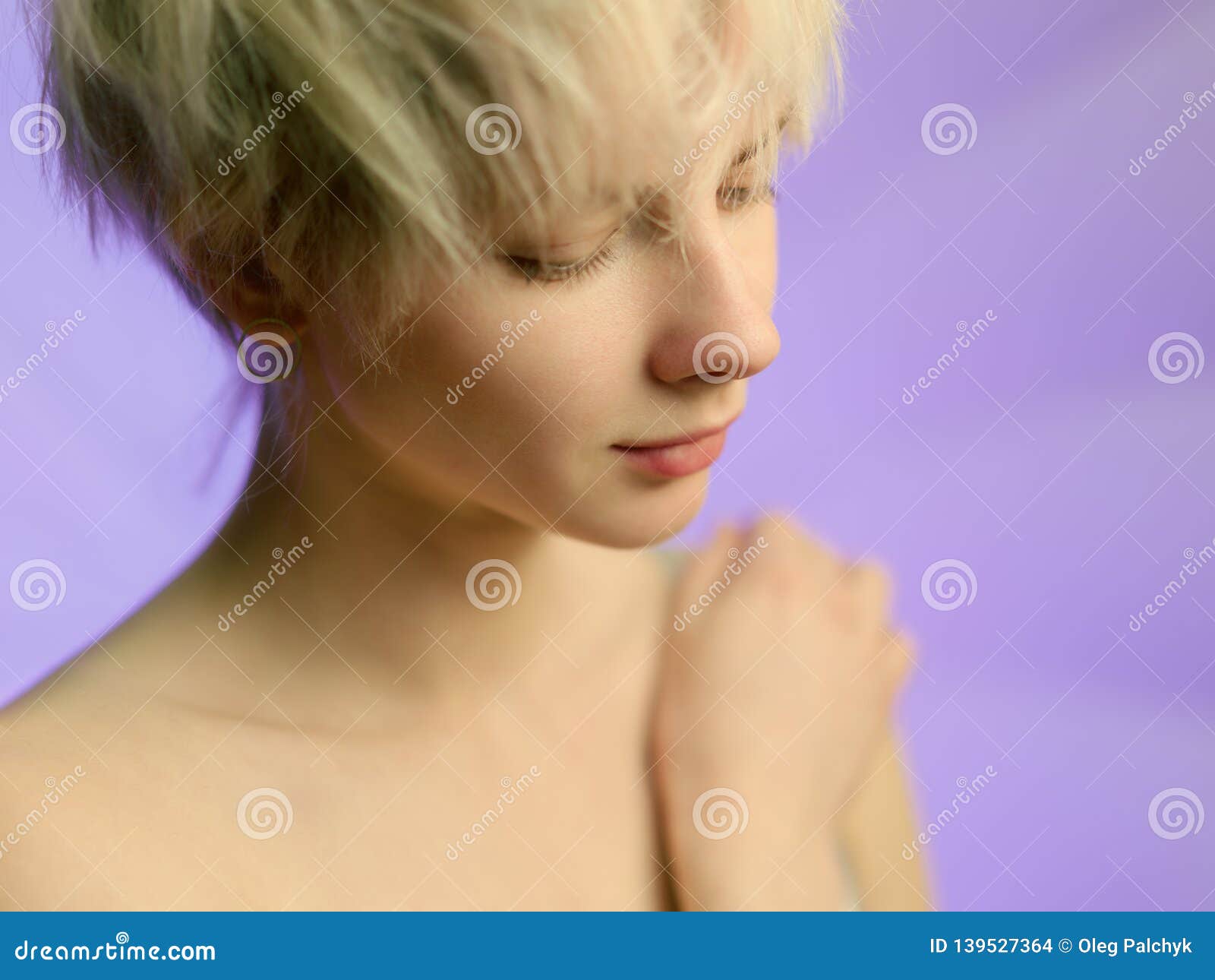 https://thumbs.dreamstime.com/z/sensual-slavic-blond-woman-looking-down-young-model-perfect-appearance-naked-shoulders-neck-posing-purple-139527364.jpg