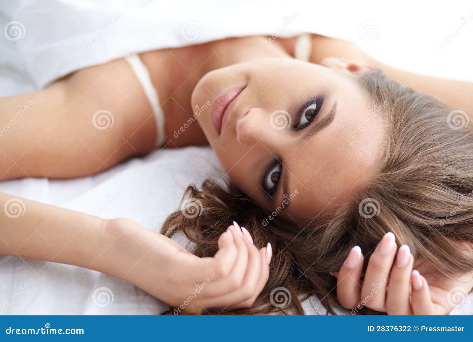 Sexy Woman With Hot Body Posing In Bed Stock Photo, Picture and Royalty  Free Image. Image 11130975.