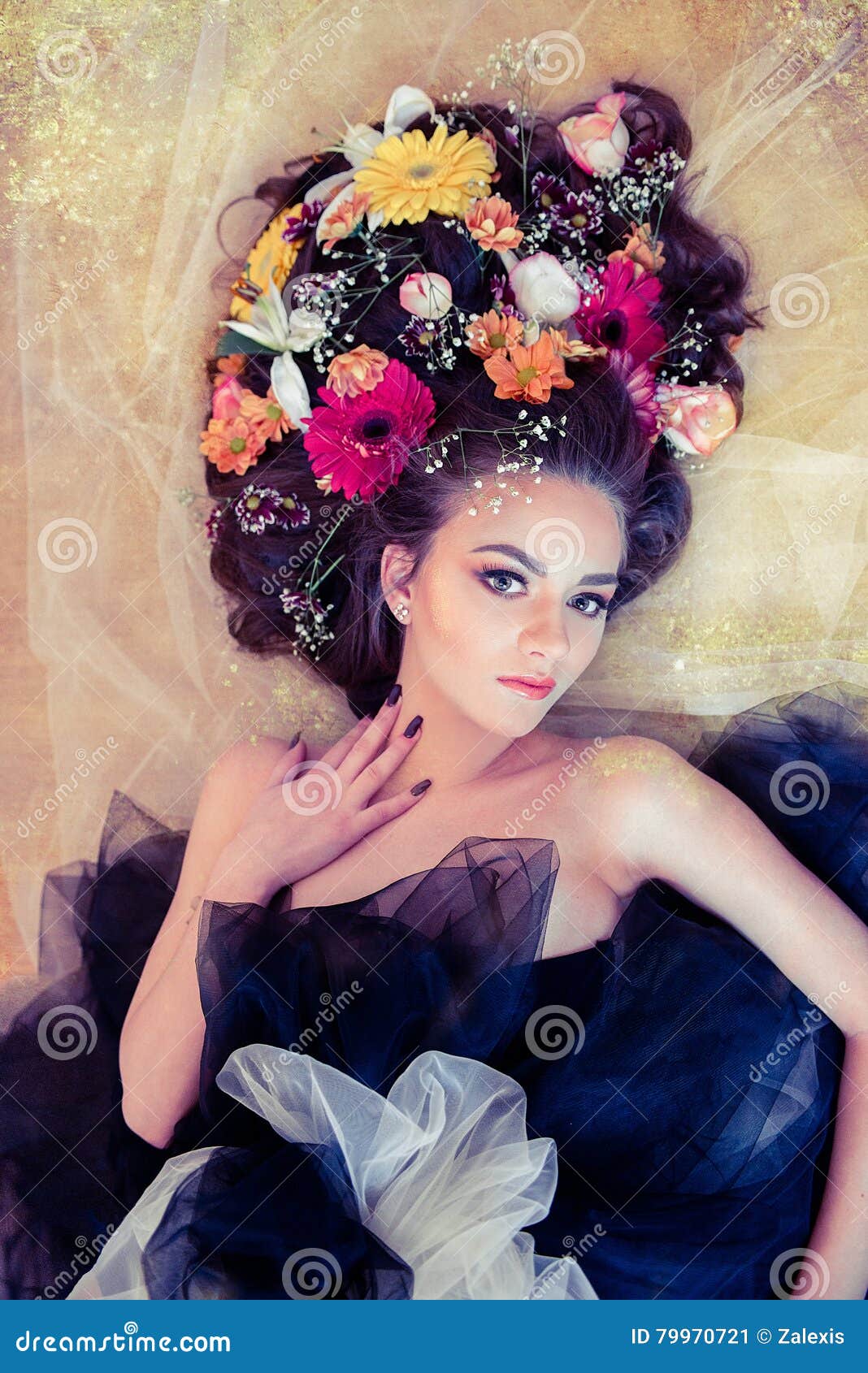 Sensual Woman with Flowers in Her Hair Touching Her Neck on Gold Stock ...