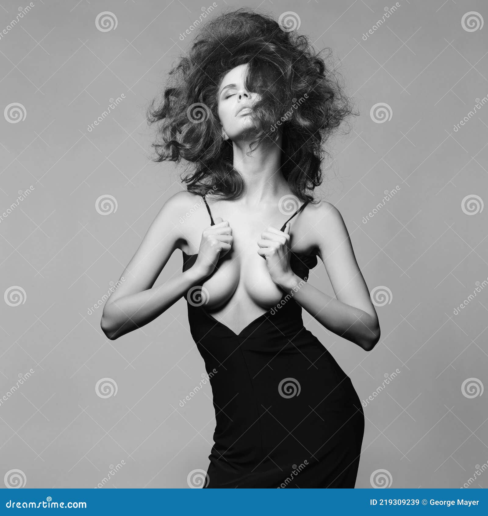 sensual woman with volume wavy hair