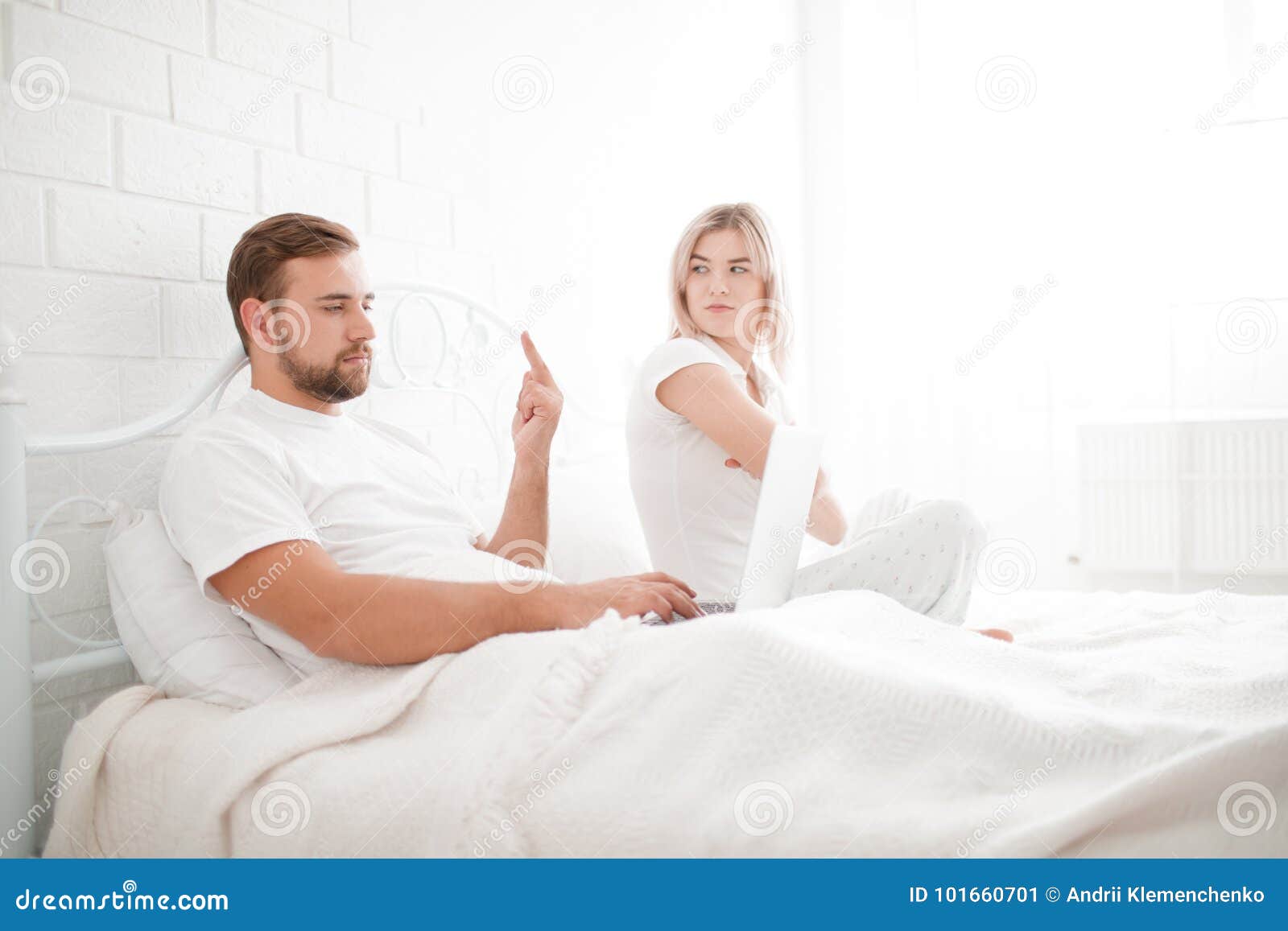 Sensual Young Couple Together in Bed. Angry Couple in Bedroo